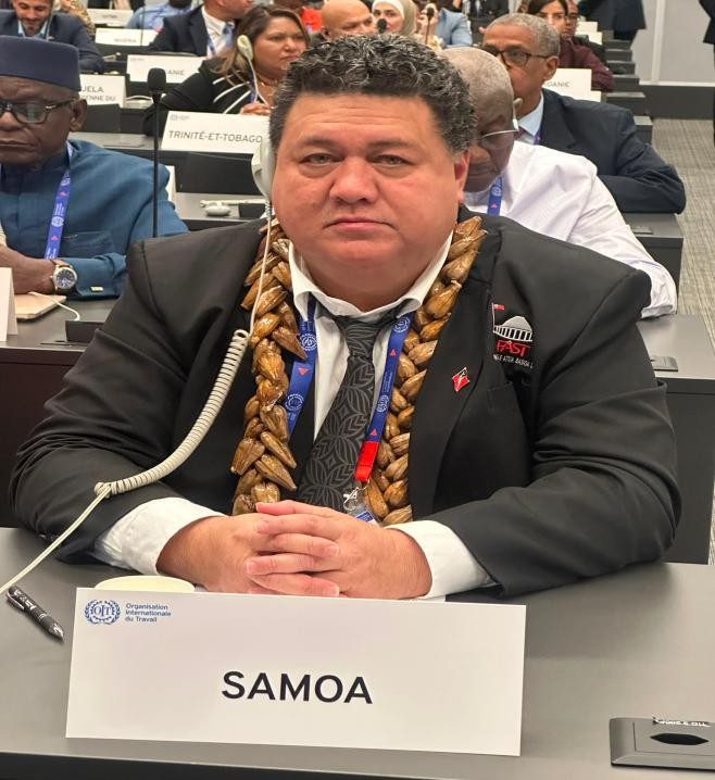 Minister Fata Ryan Schuster at the Samoa desk during the 114th Session of the International Labour Conference.
